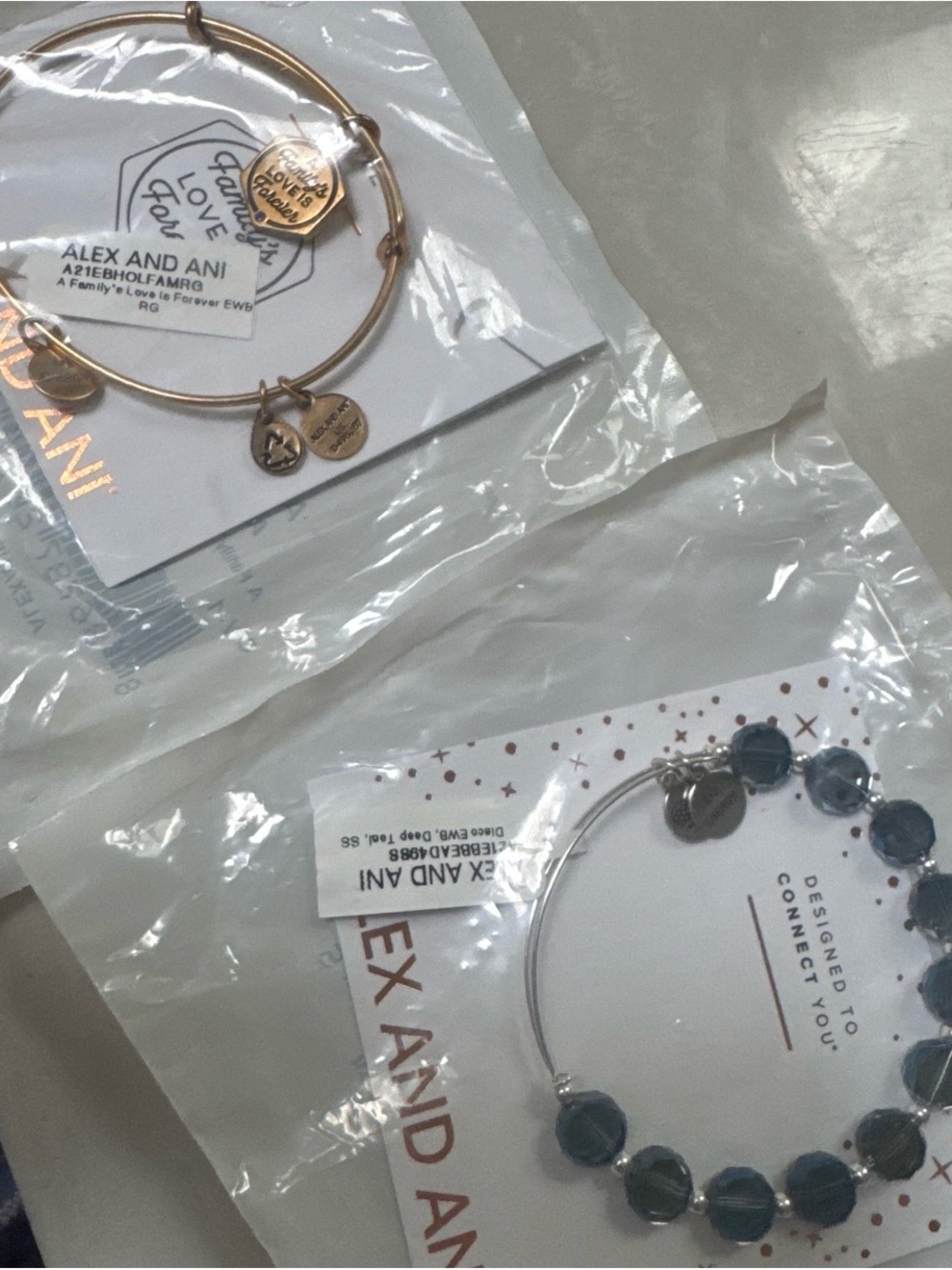 NWT 2 Alex and Ani bracelets silver and blue and gold tone bracelets